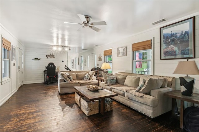 living room featuring ceiling fan, dark wood finished floors, and visible vents