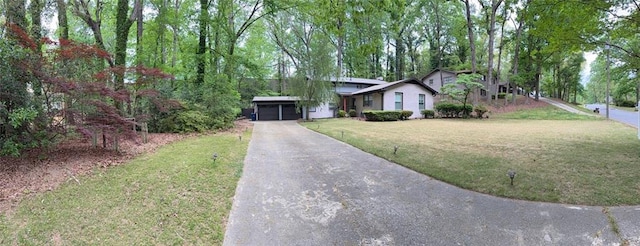 3629 Embry Cir, Atlanta, GA 30341 - ranch-style house with driveway and a front lawn
