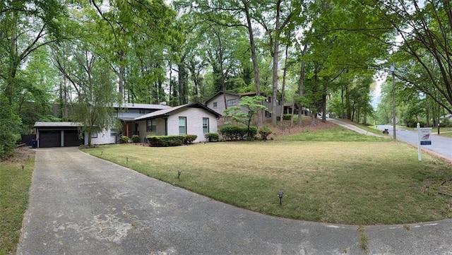3629 Embry Cir, Atlanta, GA 30341 - single story home with a garage, a front yard, and aphalt driveway