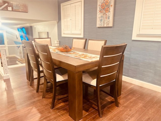 3629 Embry Cir, Atlanta, GA 30341 - dining room featuring wallpapered walls, wood finished floors, and baseboards