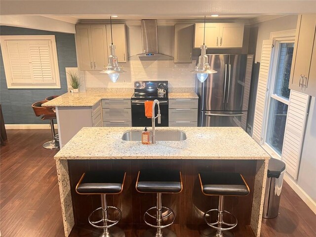 3629 Embry Cir, Atlanta, GA 30341 - kitchen with baseboards, freestanding refrigerator, black / electric stove, and wall chimney range hood