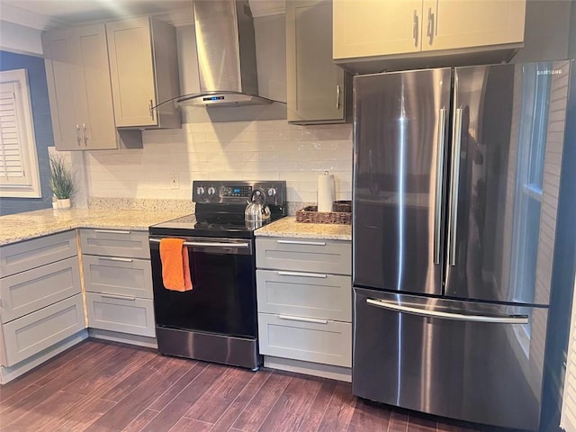 3629 Embry Cir, Atlanta, GA 30341 - kitchen featuring backsplash, freestanding refrigerator, wall chimney exhaust hood, black range with electric cooktop, and dark wood-style flooring