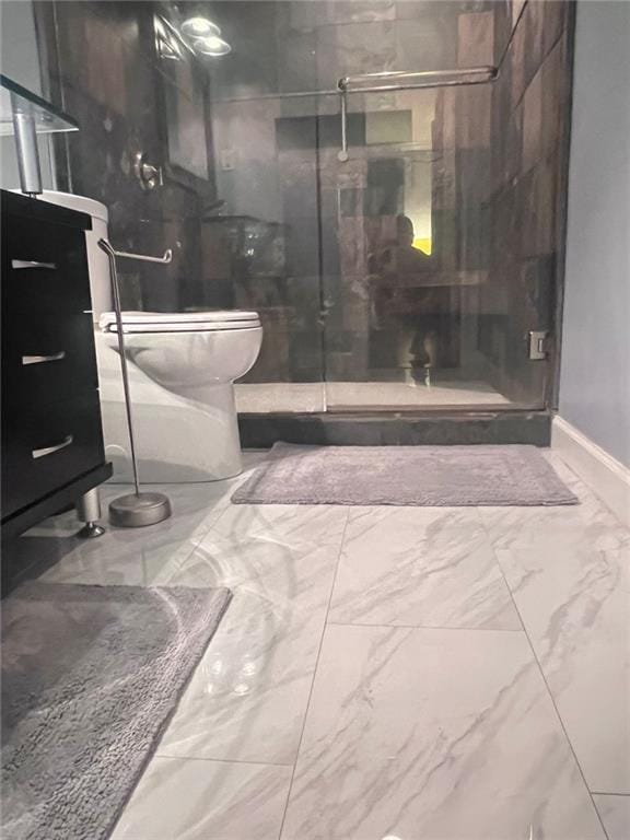 3629 Embry Cir, Atlanta, GA 30341 - bathroom featuring marble finish floor, toilet, baseboards, and a stall shower