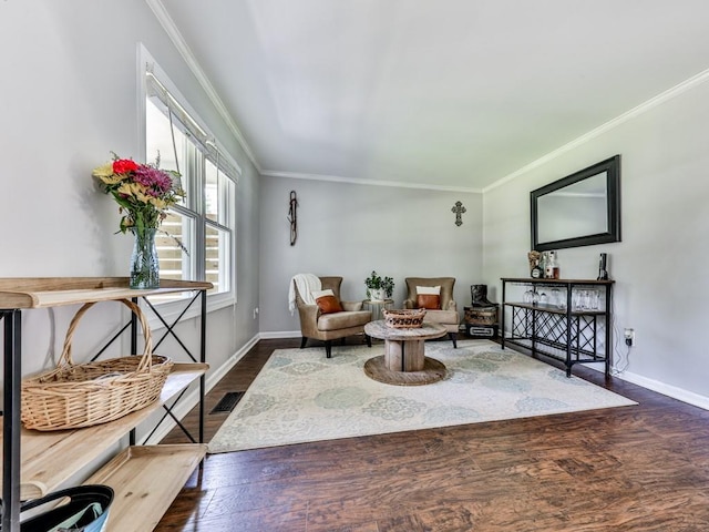 living area with crown molding, dark wood finished floors, and baseboards