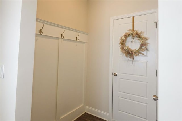 mudroom featuring dark wood-type flooring