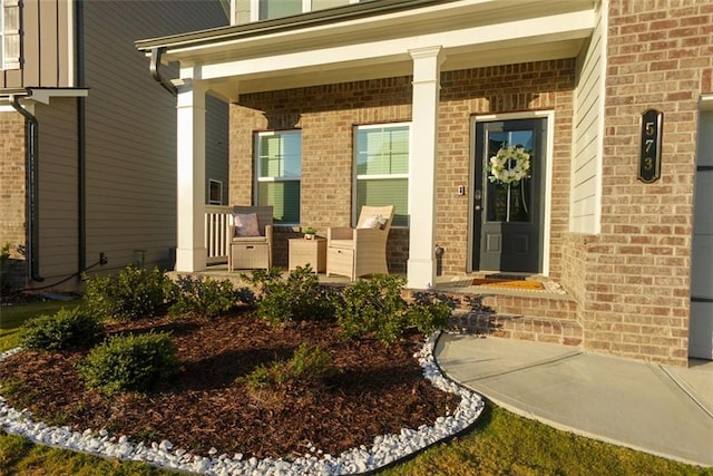 property entrance with covered porch