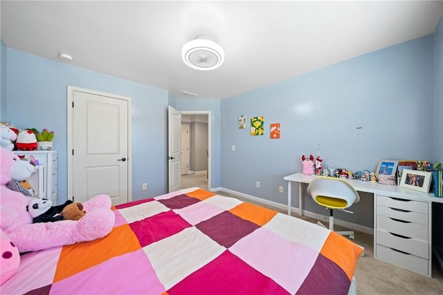 carpeted bedroom with baseboards