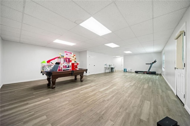playroom featuring a drop ceiling, baseboards, billiards, and wood finished floors