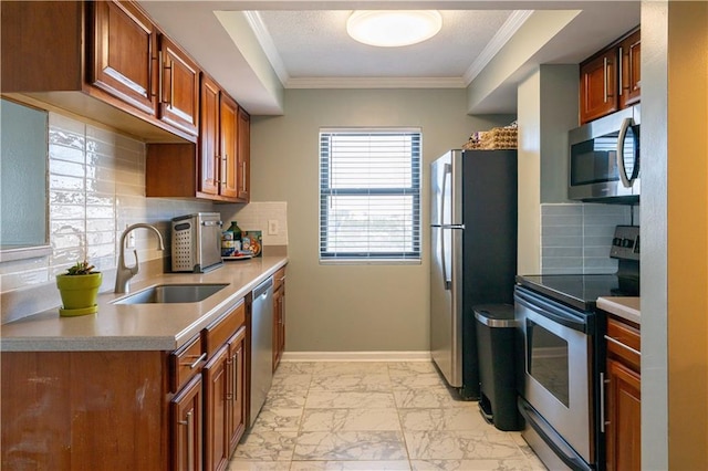 kitchen with appliances with stainless steel finishes, brown cabinets, marble finish floor, crown molding, and a sink