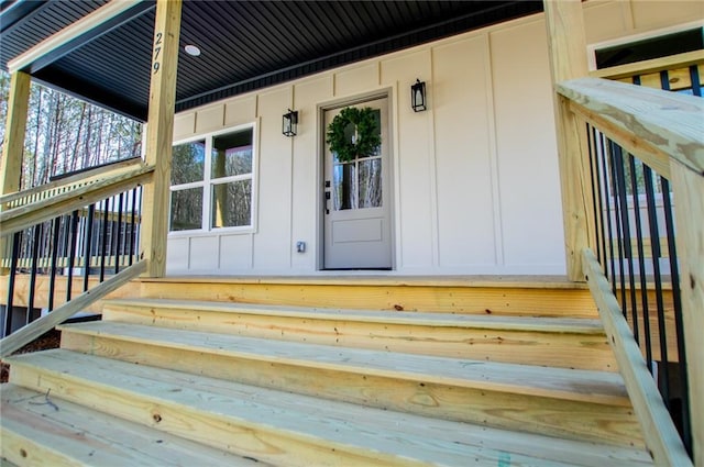 property entrance with board and batten siding