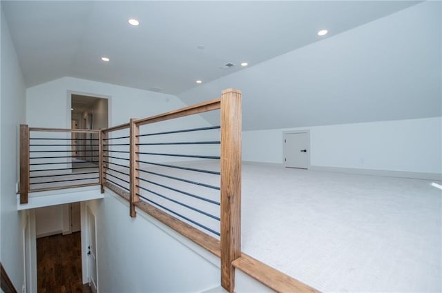 bonus room with lofted ceiling, visible vents, baseboards, and recessed lighting