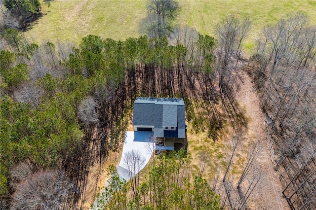 aerial view featuring a view of trees