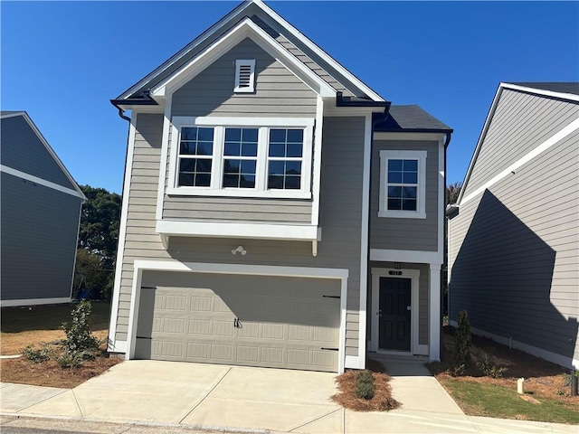 view of front of home with a garage