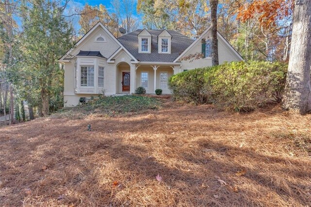 view of new england style home