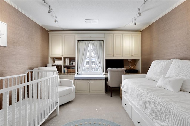 bedroom with light carpet, visible vents, wallpapered walls, and ornamental molding