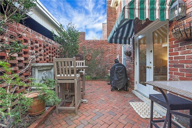 view of patio with grilling area and french doors