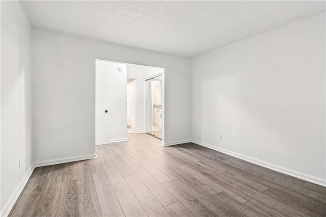 1931 Brian Way, Decatur, GA 30033 - spare room with wood finished floors and baseboards