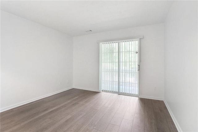 1931 Brian Way, Decatur, GA 30033 - unfurnished room with wood finished floors and baseboards