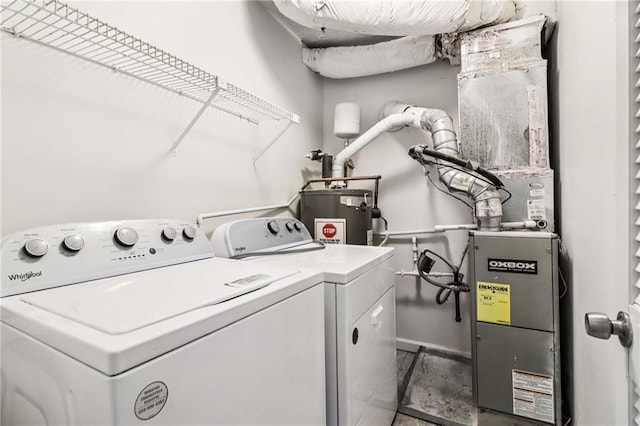 1931 Brian Way, Decatur, GA 30033 - washroom with washing machine and dryer, electric water heater, and baseboards