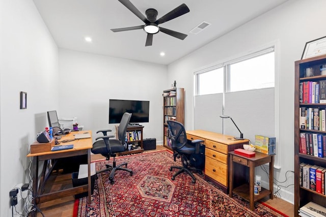 office with a ceiling fan, wood finished floors, visible vents, baseboards, and recessed lighting