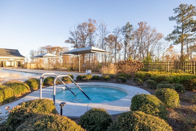 view of pool featuring fence and a fenced in pool