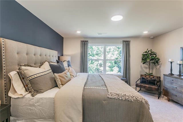 bedroom featuring carpet and visible vents