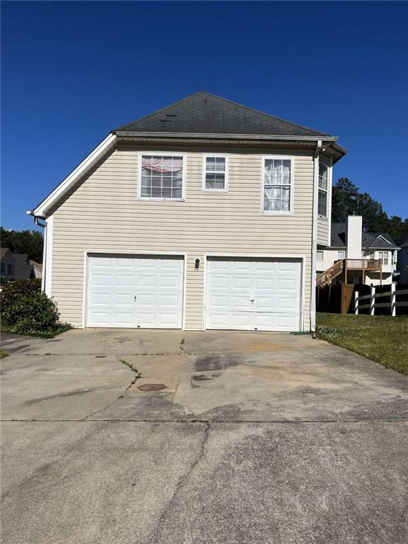 exterior space with a garage