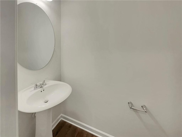 6077 Oakley Rd, Union City, GA 30291 - bathroom featuring hardwood / wood-style floors