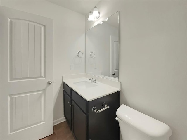 6077 Oakley Rd, Union City, GA 30291 - bathroom with vanity, tile patterned floors, and toilet