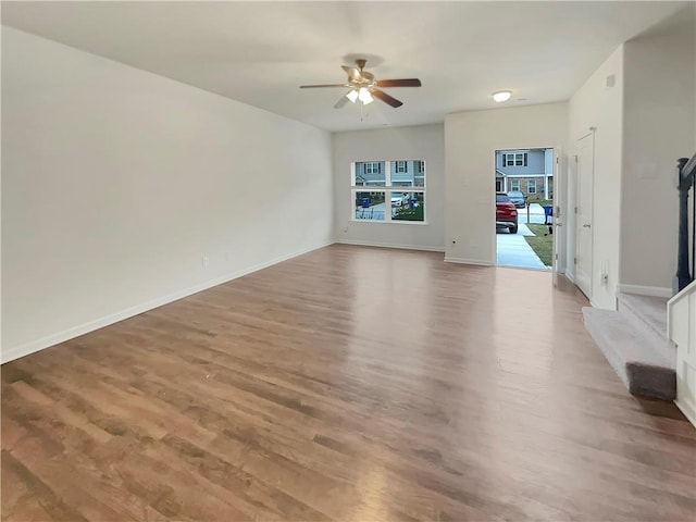 6077 Oakley Rd, Union City, GA 30291 - unfurnished living room with ceiling fan and light hardwood / wood-style flooring
