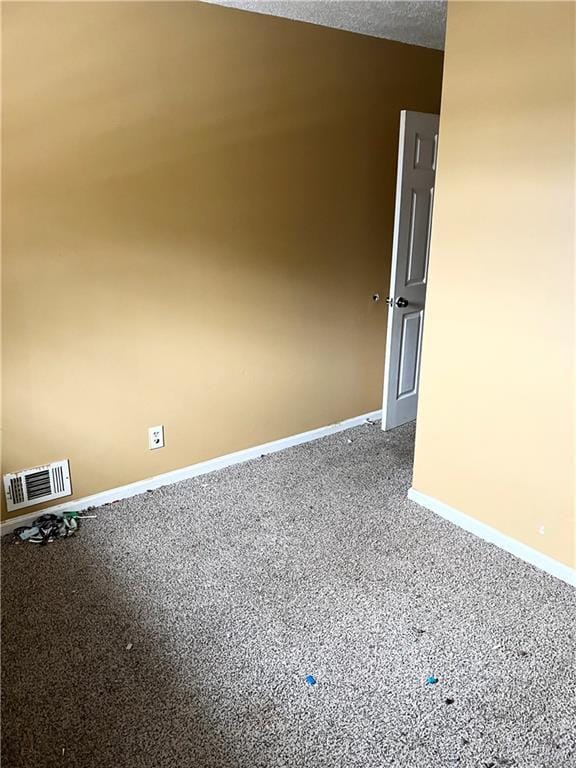 6354 Shannon Pkwy Unit 30D, Union City, GA 30291 - carpeted empty room with a textured ceiling