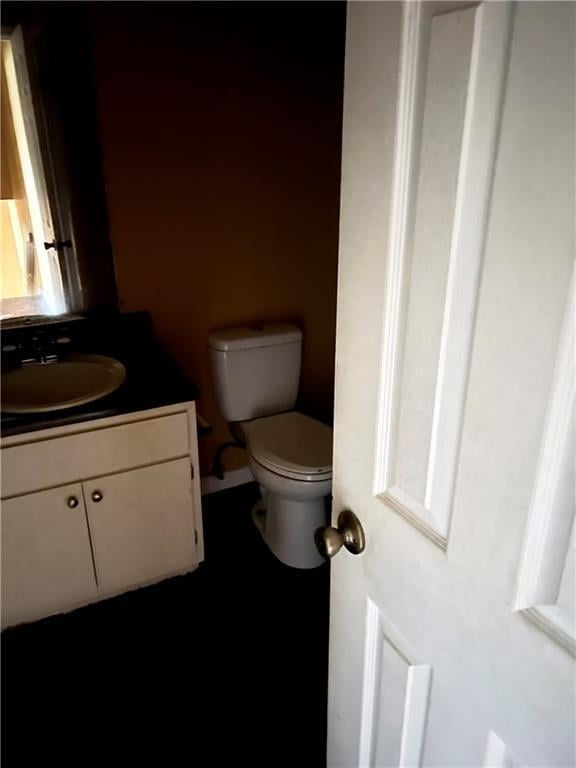 6354 Shannon Pkwy Unit 30D, Union City, GA 30291 - bathroom featuring vanity and toilet