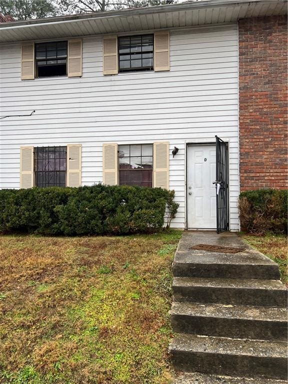 6354 Shannon Pkwy Unit 30D, Union City, GA 30291 - view of front of house featuring a front lawn