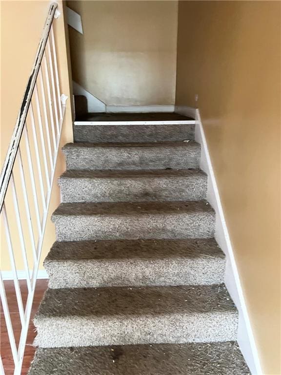6354 Shannon Pkwy Unit 30D, Union City, GA 30291 - staircase with wood-type flooring