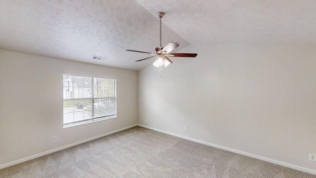 488 Barclay Ct, Stone Mountain, GA 30083 - empty room with a ceiling fan, a textured ceiling, light carpet, and lofted ceiling
