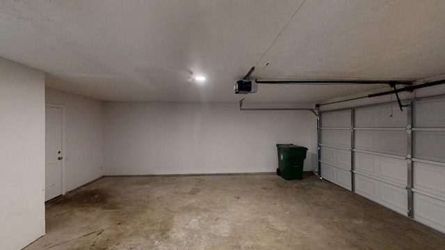 488 Barclay Ct, Stone Mountain, GA 30083 - garage featuring a garage door opener