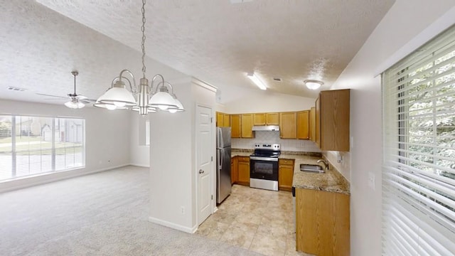 488 Barclay Ct, Stone Mountain, GA 30083 - kitchen featuring appliances with stainless steel finishes, a textured ceiling, under cabinet range hood, a chandelier, and open floor plan