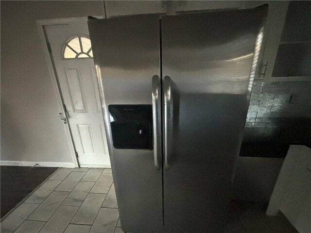 kitchen featuring stainless steel fridge