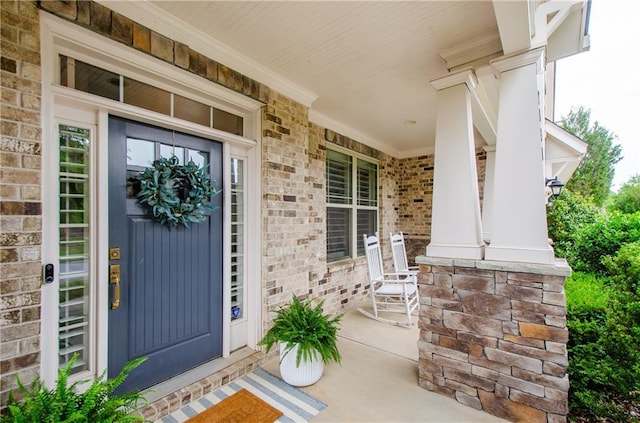 2535 Castlerock Ct, Cumming, GA 30041 - entrance to property with a porch and brick siding