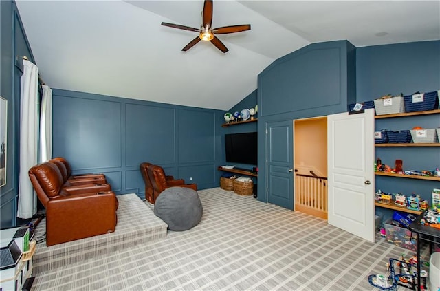 2535 Castlerock Ct, Cumming, GA 30041 - carpeted bedroom with a decorative wall, vaulted ceiling, and a ceiling fan