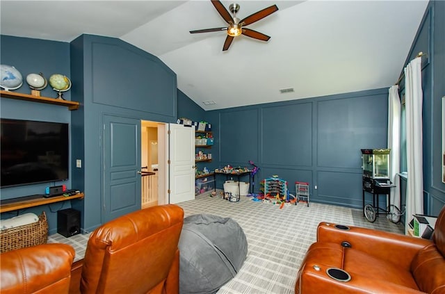 2535 Castlerock Ct, Cumming, GA 30041 - recreation room with a decorative wall, a ceiling fan, lofted ceiling, and carpet flooring