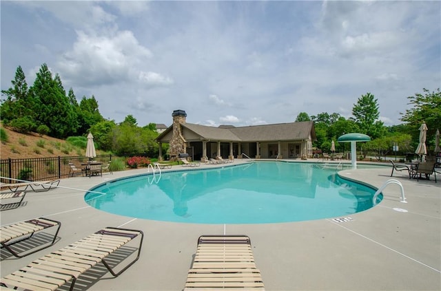 2535 Castlerock Ct, Cumming, GA 30041 - community pool with a patio area