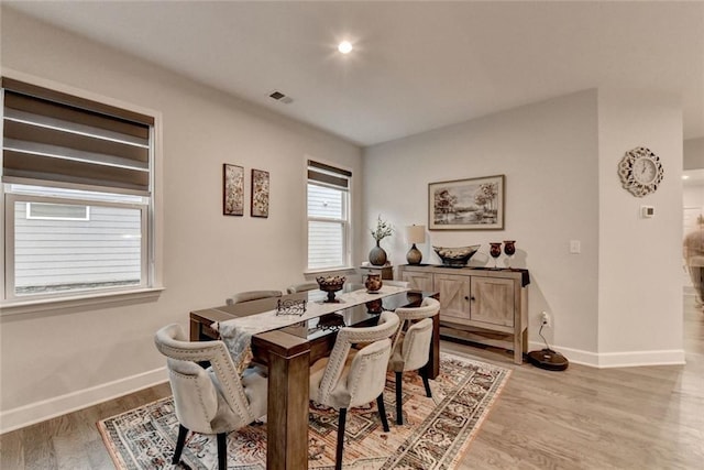 811 Pineberry Ct, Grayson, GA 30017 - dining area featuring baseboards and light wood-style floors