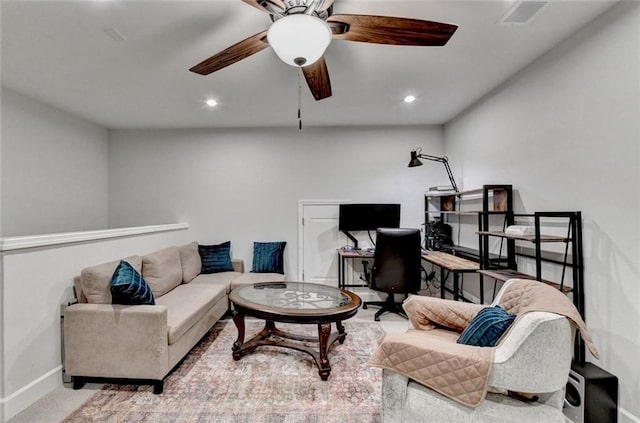 living area with carpet, visible vents, baseboards, and recessed lighting