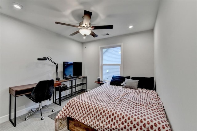 carpeted bedroom with a ceiling fan, recessed lighting, visible vents, and baseboards