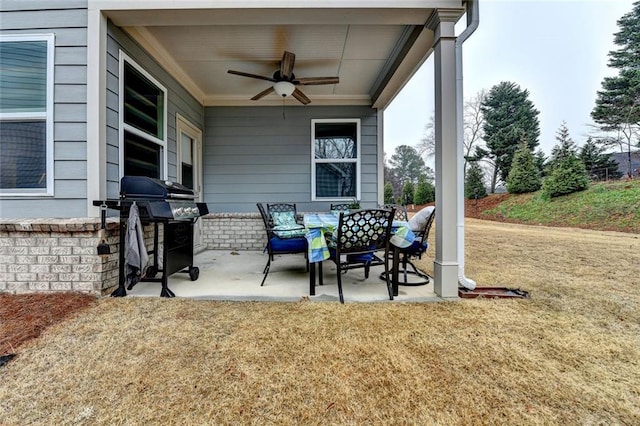 view of patio / terrace with a ceiling fan and area for grilling