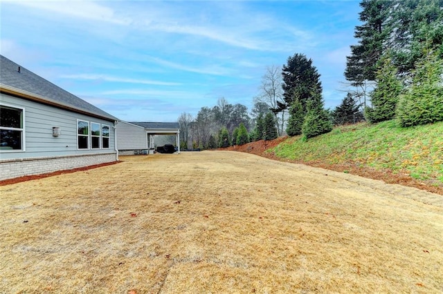 811 Pineberry Ct, Grayson, GA 30017 - view of yard with a detached carport