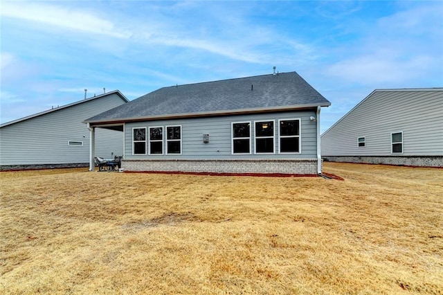 811 Pineberry Ct, Grayson, GA 30017 - back of house with a yard and a shingled roof
