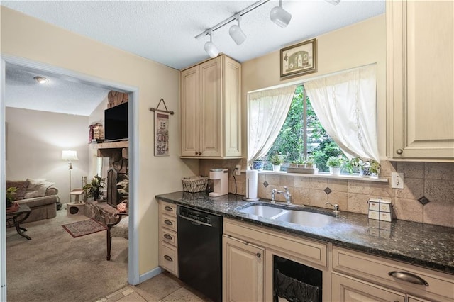9760 Loblolly Ln, Roswell, GA 30075 - kitchen featuring black dishwasher, cream cabinetry, a sink, a textured ceiling, and light colored carpet