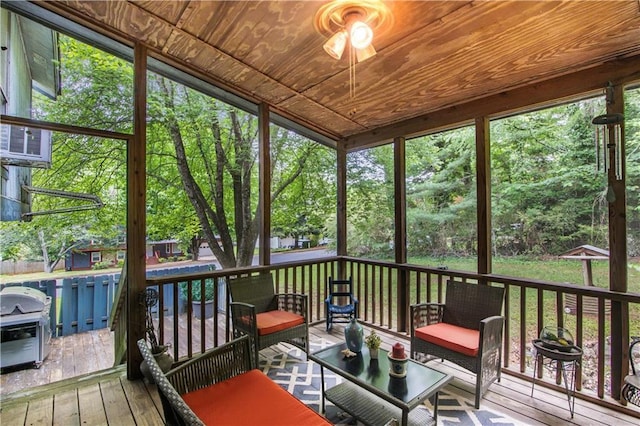 9760 Loblolly Ln, Roswell, GA 30075 - sunroom with ceiling fan, outdoor lounge area, and view of wooded area